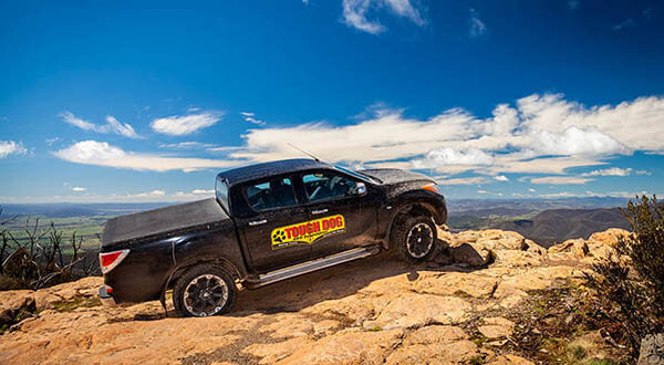 Nissan Navara with Tough Dog 4WD Suspension on Rock